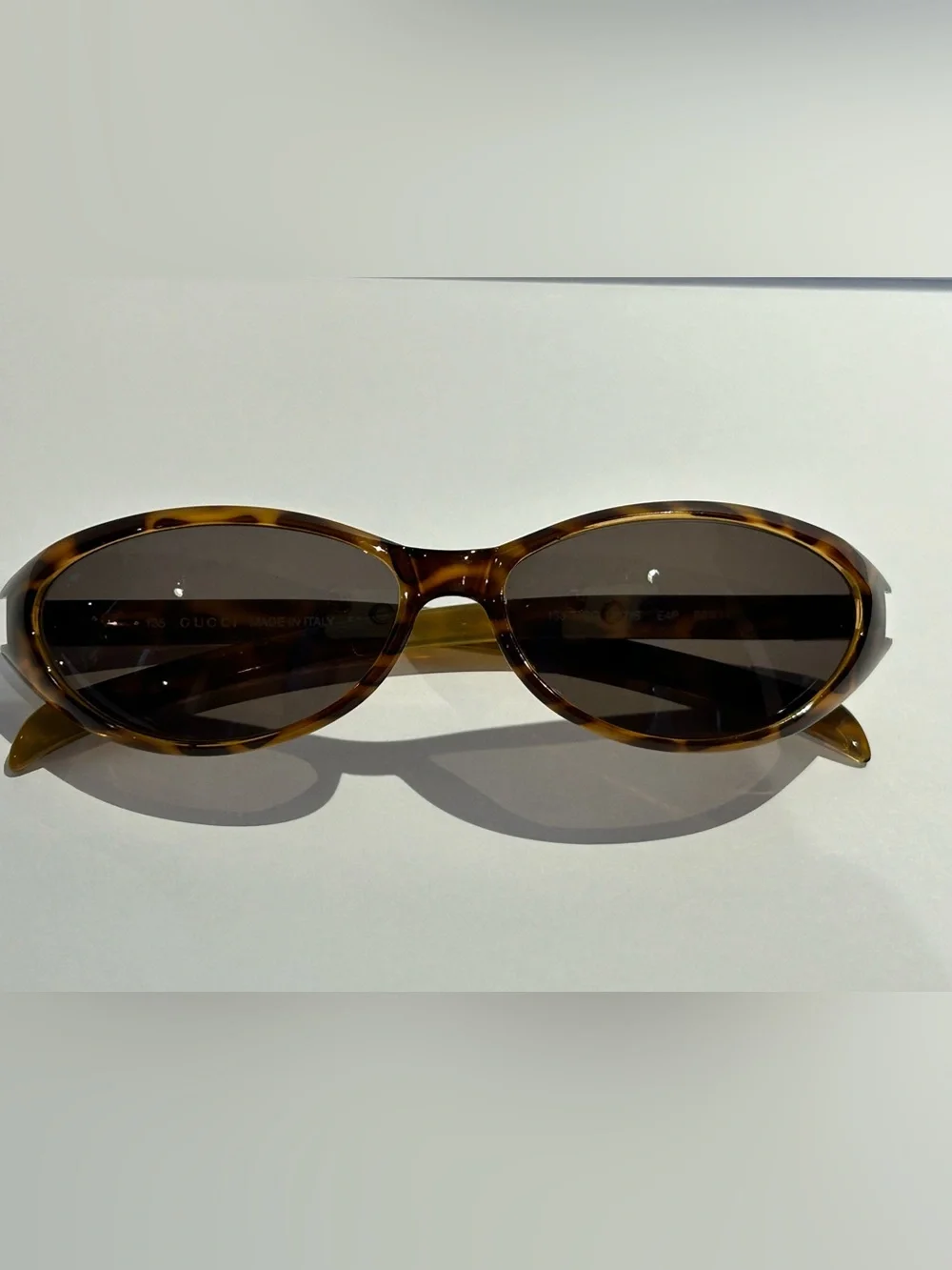 Gucci Tortoiseshell Oval Sunglasses with Brown Lenses